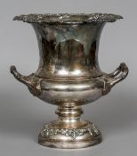 A Sheffield plate wine cooler Of typical twin handled flared form,