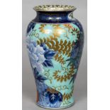 A 19th century Japanese vase Of waisted cylindrical form, decorated in the Imari palette,