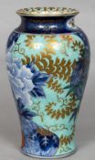 A 19th century Japanese vase Of waisted cylindrical form, decorated in the Imari palette,