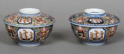 A pair of late 19th century Japanese Nanban bowls and covers Decorated in the Imari palette and