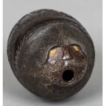 A 19th century carved coconut bugbear Of typical form,