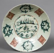 A 16th century Chinese Swatow porcelain bowl Typically decorated in iron red, green and black.