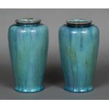 A pair of Pilkingtons Royal Lancastrian pottery vases Each with allover streaky turquoise glaze,