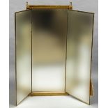 A 19th century French giltwood triptych mirror Of fabric backed folding form inscribed Miroir Brot.