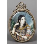 INDIAN SCHOOL (19th/20th century) Portrait of a Maharani Watercolours probably on ivory,