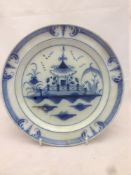 A late 18th century English pearlware plate Centrally decorated with a chinoiserie pagoda. 23.