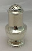 A George II silver pepper, hallmarked London 1728,