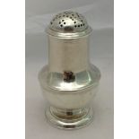 A George II silver pepper, hallmarked London 1728,