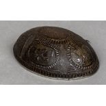 A 19th century unmarked silver mounted coconut shell The half coconut mounted with a suspension