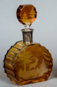 A Bohemian 800 standard silver mounted amber glass decanter and stopper The body engraved with a