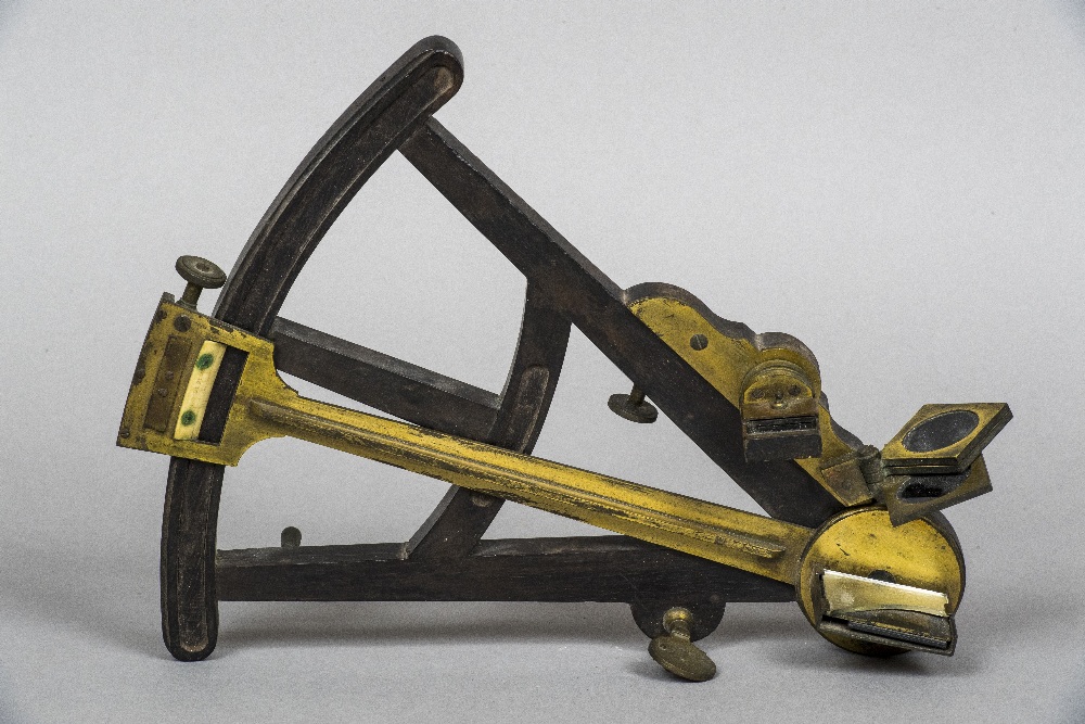 A 19th century brass mounted ebony octant Of typical form;