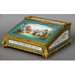 A 19th century ormolu mounted porcelain inset writing slope Inset with Sevres type painted