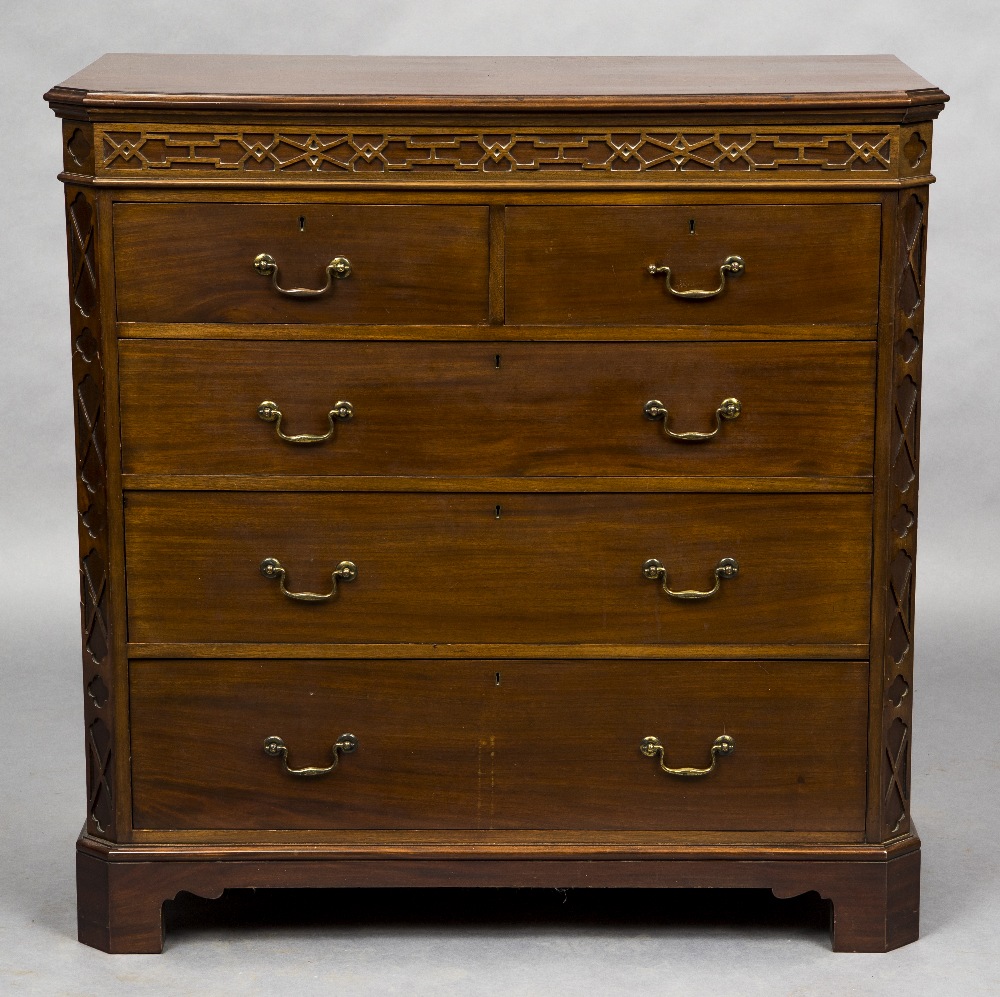 An early 20th century mahogany chest of drawers The moulded canted rectangular top above a blind