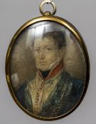 A 19th century portrait miniature on ivory Depicting a young military officer,