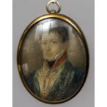 A 19th century portrait miniature on ivory Depicting a young military officer,