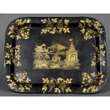 A 19th century toleware tray Decorated with a central chinoiserie scene with a scrolling floral