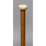 An ivory handled malacca walking stick The top with pique inlays inscribed Seek and Ye Shall Find.