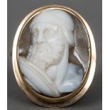 An unmarked gold framed cameo brooch Deeply carved as the bust of a classical Greek soldier or God.