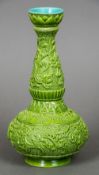 A Chinese porcelain vase Decorated with dragons on a green background,