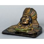 A Continental cold painted bronze inkwell Worked as a Native American wearing traditional headdress,