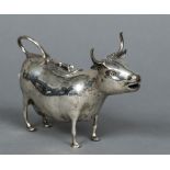 A 19th/20th century silver novelty cow creamer, probably Hanau Typically modelled. 14 cm long.