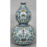 A Chinese Wucai porcelain double gourd vase Decorated with lotus strapwork,