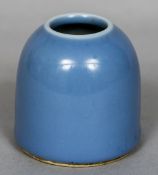 A Chinese porcelain beehive brush pot With allover blue glaze,