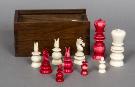An early 19th century Anglo-Indian mono-block turned ivory and stained ivory chess set The Kings