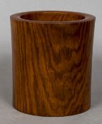 A Chinese hardwood brush pot Of plain cylindrical form. 14.5 cm high.