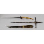 An early steel dagger Together with two other daggers. The former 46 cm long.