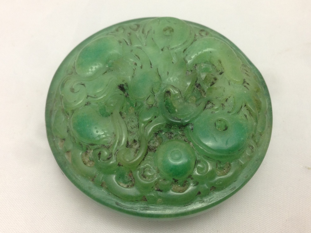 A Chinese carved jade belt hook Of circular form, carved with a dragon. 5.5 cm diameter. - Image 2 of 6