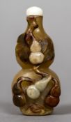 A Chinese carved hardstone snuff bottle Of double gourd form,