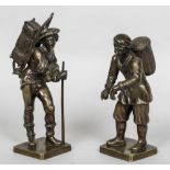 A pair of 19th century Continental patinated bronze models of pedlars Each modelled standing