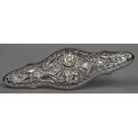 An 14 ct white gold diamond set Art Deco brooch The two primary diamonds approximately 0.