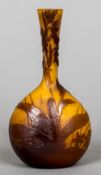 A small early 20th century Galle cameo glass vase Decorated on an orange ground with floral sprays,