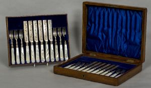 A set of Victorian and later silver fruit knives and forks, hallmarked Sheffield 1899, 1900, 1907,