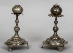 Two Continental white metal Havdalah spice towers Each with flowerhead finials supported on a