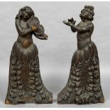 A pair of 18th century baroque carved pine figures, probably Venetian Each formed as a musician,