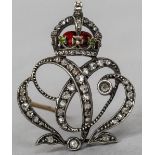 An unmarked white metal diamond set and enamelled sweetheart brooch Surmounted with a crown. 2.