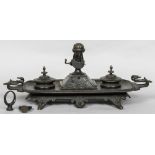 A large 19th century patinated bronze desk stand The main body with twin swan mask handles,