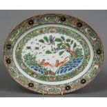 A large 19th century Cantonese famille rose platter Of dished oval form,