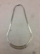 A 925 silver necklace, import mark for Sheffield 1975 45 cm long overall.