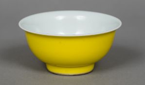 A Chinese porcelain bowl The exterior painted yellow,
