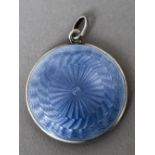 A guilloche enamel decorated silver pendant locket, maker's mark of TF Of circular form.