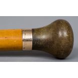 An early 20th century Brigg of London walking stick or parasol top section The knop finial possibly