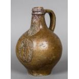 A small late 16th/early 17th century stoneware Bellarmine flagon Of typical form with moulded mask,