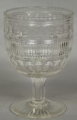 A 19th century cut crystal pedestal bowl 25.5 cm high.