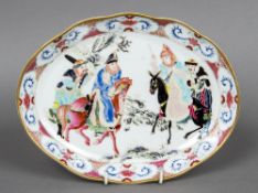 A Chinese porcelain dish Decorated with horsemen and attendants within a wavy gilt rim. 27 cm wide.