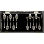 A matched set of ten silver coffee spoons, hallmarked Sheffield 1899 and 1921,