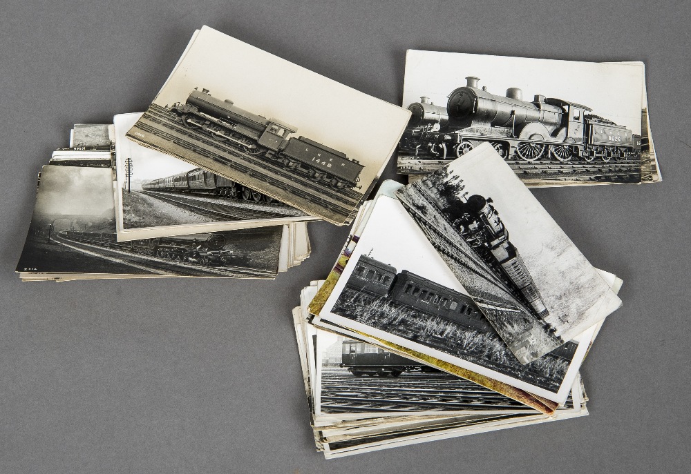 A collection of various photographs and postcards Each pertaining to railways, various sizes.